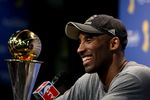 ORLANDO, FL - JUNE 14:  Kobe Bryant #24 of the Los Angeles Lakers smiles during the post game news conference after the Lakers defeated the Orlando Magic 99-86 to win the NBA Championship in Game Five of the 2009 NBA Finals on June 14, 2009 at Amway Arena in Orlando, Florida.  NOTE TO USER:  User expressly acknowledges and agrees that, by downloading and or using this photograph, User is consenting to the terms and conditions of the Getty Images License Agreement.  (Photo by Elsa/Getty Images)