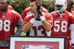 TEMPE, AZ - MAY 2 :  Kurt Warner #13 of the Arizona Cardinals is presented with his 2009 Pro Bowl jersey during a team minicamp at the team training facility on May 2, 2009 in Tempe, Arizona.  (Photo by Jonathan Willey/Getty Images)