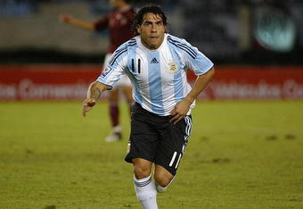 BUENOS AIRES, ARGENTINA - MARCH 28:  Carlos Tevez of Argentina celebrates the second goal during the 2010 FIFA World Cup South African qualifier match between Argentina and Venezuela at River Plate Stadium on March 28, 2009 in Buenos Aires, Argentina.  (Photo by Photogamma/Getty Images)