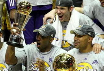 ORLANDO, FL - JUNE 14:  The Los Angeles Lakers celebrate after defeating the Orlando Magic 99-86 in Game Five of the 2009 NBA Finals on June 14, 2009 at Amway Arena in Orlando, Florida.  NOTE TO USER:  User expressly acknowledges and agrees that, by downloading and or using this photograph, User is consenting to the terms and conditions of the Getty Images License Agreement.  (Photo by Elsa/Getty Images)