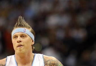 DENVER - MAY 29:  Chris Andersen #11 of the Denver Nuggets looks on against the Los Angeles Lakers in Game Six of the Western Conference Finals during the 2009 NBA Playoffs at Pepsi Center on May 29, 2009 in Denver, Colorado. NOTE TO USER: User expressly acknowledges and agrees that, by downloading and or using this photograph, User is consenting to the terms and conditions of the Getty Images License Agreement.  (Photo by Jed Jacobsohn/Getty Images)
