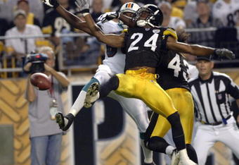 Pittsburgh Steelers cornerback Ike Taylor defends against a pass to Miami Dolphins wide receiver Chris Chambers in the NFL's opening 2006 game on September 7, 2006 at Heinz Field in Pittsburgh, Pennsylvania.  (Photo by Al Messerschmidt/Getty Images)