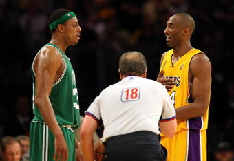 LOS ANGELES, CA - JUNE 10:  Paul Pierce #34 of the Boston Celtics and Kobe Bryant #24 of the Los Angeles Lakers look over at each other in Game Three of the 2008 NBA Finals on June 10, 2008 at Staples Center in Los Angeles, California. NOTE TO USER: User expressly acknowledges and agrees that, by downloading and/or using this Photograph, user is consenting to the terms and conditions of the Getty Images License Agreement.  (Photo by Jed Jacobsohn/Getty Images)