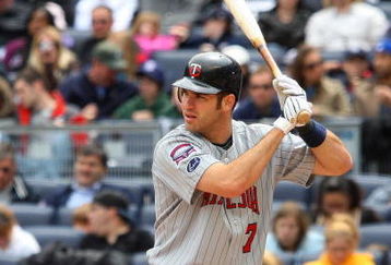 NEW YORK - MAY 17:  Joe Mauer #7 of the Minnesota Twins bats against the New York Yankees on May 17, 2009 at Yankee Stadium in the Bronx borough of New York City. The Yankees defeated the Twins 3-2 in ten innings.  (Photo by Jim McIsaac/Getty Images)