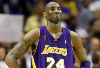 ORLANDO, FL - JUNE 14:  Kobe Bryant #24 of the Los Angeles Lakers reacts in the fourth quarter before defeating the Orlando Magic 99-86 in Game Five of the 2009 NBA Finals on June 14, 2009 at Amway Arena in Orlando, Florida.  NOTE TO USER:  User expressly acknowledges and agrees that, by downloading and or using this photograph, User is consenting to the terms and conditions of the Getty Images License Agreement.  (Photo by Elsa/Getty Images)