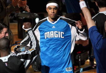 ORLANDO, FL - JUNE 9:  Courtney Lee #11 of the Orlando Magic is introduced before Game Three of the 2009 NBA Finals against the Los Angeles Lakers on June 9, 2009 at Amway Arena in Orlando, Florida.  The Magic won 108-104.  NOTE TO USER:  User expressly acknowledges and agrees that, by downloading and or using this photograph, User is consenting to the terms and conditions of the Getty Images License Agreement. (Photo by Elsa/Getty Images)