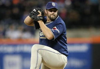 FLUSHING, NY - APRIL 13:  Heath Bell #21 of the San Diego Padres pitches against the New York Mets during opening day at Citi Field on April 13, 2009 in the Flushing neighborhood of the Queens borough of New York City. This is the first regular season MLB game being played at the new venue which replaced Shea Stadium as the Mets home field.  (Photo by Nick Laham/Getty Images)