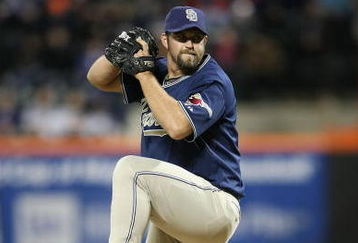 FLUSHING, NY - APRIL 13:  Heath Bell #21 of the San Diego Padres pitches against the New York Mets during opening day at Citi Field on April 13, 2009 in the Flushing neighborhood of the Queens borough of New York City. This is the first regular season MLB game being played at the new venue which replaced Shea Stadium as the Mets home field.  (Photo by Nick Laham/Getty Images)