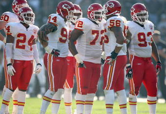OAKLAND, CA - NOVEMBER 30:  Brandon Flowers #24, Jason Babin #94, Glenn Dorsey #72, Derrick Johnson #56 and Tank Tyler #93 of the Kansas City Chiefs huddle on the field against the Oakland Raiders during an NFL game on November 30, 2008 at the Oakland-Alameda County Coliseum in Oakland, California. (Photo by Jed Jacobsohn/Getty Images)