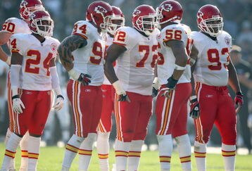 OAKLAND, CA - NOVEMBER 30:  Brandon Flowers #24, Jason Babin #94, Glenn Dorsey #72, Derrick Johnson #56 and Tank Tyler #93 of the Kansas City Chiefs huddle on the field against the Oakland Raiders during an NFL game on November 30, 2008 at the Oakland-Alameda County Coliseum in Oakland, California. (Photo by Jed Jacobsohn/Getty Images)