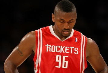LOS ANGELES, CA - MAY 17:  Ron Artest #96 of the Houston Rockets looks down in the first quarter against the Los Angeles Lakers in Game Seven of the Western Conference Semifinals during the 2009 NBA Playoffs at Staples Center on May 17, 2009 in Los Angeles, California. NOTE TO USER: User expressly acknowledges and agrees that, by downloading and or using this photograph, User is consenting to the terms and conditions of the Getty Images License Agreement.  (Photo by Stephen Dunn/Getty Images)