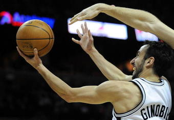 SAN ANTONIO - JANUARY 31:  Guard Manu Ginobili #20 of the San Antonio Spurs takes a shot against the New Orleans Hornets on January 31, 2009 at AT&T Center in San Antonio, Texas.  NOTE TO USER: User expressly acknowledges and agrees that, by downloading and/or using this Photograph, user is consenting to the terms and conditions of the Getty Images License Agreement.  (Photo by Ronald Martinez/Getty Images)