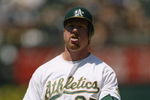 21 Jul 1997:  First baseman Mark McGwire of the Oakland Athletics looks on during a game against the Minnesota Twins at the Oakland Coliseum in Oakland, California.  Minnesota won the game 1-0. Mandatory Credit: Otto Greule  /Allsport