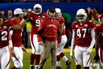 TAMPA, FL - FEBRUARY 01:  Head coach Ken Whisenhunt of the Arizona Cardinals stands amongst his players against the Pittsburgh Steelers in Super Bowl XLIII on February 1, 2009 at Raymond James Stadium in Tampa, Florida. Steelers won 27-23. (Photo by Win McNamee/Getty Images)