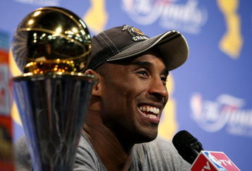ORLANDO, FL - JUNE 14:  Kobe Bryant #24 of the Los Angeles Lakers smiles during the post game news conference after the Lakers defeated the Orlando Magic 99-86 to win the NBA Championship in Game Five of the 2009 NBA Finals on June 14, 2009 at Amway Arena in Orlando, Florida.  NOTE TO USER:  User expressly acknowledges and agrees that, by downloading and or using this photograph, User is consenting to the terms and conditions of the Getty Images License Agreement.  (Photo by Elsa/Getty Images)
