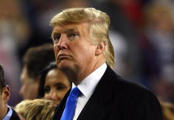 FOXBOROUGH, MA - JANUARY 12:  Donald Trump stands on the sidelines before the start of the AFC Divisional playoff game between the New England Patriots and the Jacksonville Jaguars during the AFC Divisional playoff game at Gillette Stadium game on January 12, 2008 in Foxboro, Massachusetts.  (Photo by Elsa/Getty Images)