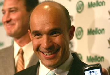 PITTSBURGH - OCTOBER 05:  Jim Balsillie Chairman and Co-CEO of Research In Motion and new owner of the Pittsburgh Penguins poses with his Blackberry in a press conference announcing the purchase of the team alongside Mario Lemieux after the first period at Mellon Arena on October 5, 2006 in Pittsburgh, Pennsylvania.  (Photo by Harry How/Getty Images) 