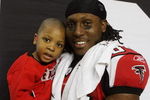 ATLANTA - DECEMBER 28:  Wide receiver Roddy White #84 of the Atlanta Falcons celebrates on the sidelines after defeating the St. Louis Rams at Georgia Dome on December 28, 2008 in Atlanta, Georgia.  The Falcons defeated the Rams 31-27.  (Photo by Doug Benc/Getty Images)