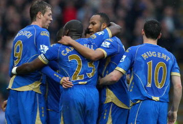 PORTSMOUTH, UNITED KINGDOM - APRIL 11:  Younes Kaboul of Portsmouth celebrates with his teammates (L-R) Peter Crouch, Sol Campbell and David Nugent after scoring the opening goal during the Barclays Premier League match between Portsmouth and West Bromwich Albion at Fratton Park on April 11, 2009 in Portsmouth, England.  (Photo by Ryan Pierse/Getty Images)