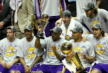 ORLANDO, FL - JUNE 14:  The Los Angeles Lakers celebrate after defeating the Orlando Magic 99-86 in Game Five of the 2009 NBA Finals on June 14, 2009 at Amway Arena in Orlando, Florida.  NOTE TO USER:  User expressly acknowledges and agrees that, by downloading and or using this photograph, User is consenting to the terms and conditions of the Getty Images License Agreement.  (Photo by Elsa/Getty Images)