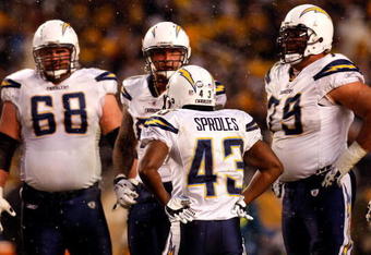 PITTSBURGH - JANUARY 11:  Darren Sproles #43 of the San Diego Chargers stands in the offensive huddle with Kris Dielman #68 Nick Hardwick #61 and Mike Goff #79 against the Pittsburgh Steelers during their AFC Divisional Playoff Game on January 11, 2009 at Heinz Field in Pittsburgh, Pennsylvania. Steelers won 35-24.  (Photo by Chris Graythen/Getty Images)