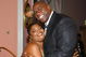 LOS ANGELES, CA - MAY 06:  Former NBA player Earvin 'Magic' Johnson (R) hugs comedian Mo'Nique during the USA TODAY Hollywood Hero honoring Magic Johnson at the Beverly Hills Hotel on May 6, 2008 in Los Angeles, California.  (Photo by Alberto E. Rodriguez/Getty Images for USA Today)