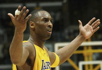 LOS ANGELES - JANUARY 27:   Kobe Bryant #8 of the Los Angeles Lakers complains about a no call in the game with the Golden State Warriors on January 27, 2006 at Staples Center in Los Angeles, California. The Lakers won 106-105 in overtime. NOTE TO USER: User expressly acknowledges and agrees that, by downloading and or using this photograph, User is consenting to the terms and conditions of the Getty Images License Agreement.   (Photo by Stephen Dunn /Getty Images)