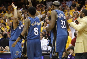 CLEVELAND - APRIL 30: Caron Butler #3 of the Washington Wizards celebrates what turned out to be the game winning shot with Roger Mason #8, Brendan Haywood #33 and Gilbert Arenas #0 while playing the Cleveland Cavaliers in Game Five of the Eastern Conference Quarterfinals during the 2008 NBA Playoffs at Quicken Loans Arena on April 30, 2008 in Cleveland, Ohio. Washington won the game 88-87 but trail in the series 2-3. NOTE TO USER: User expressly acknowledges and agrees that, by downloading and or using this photograph, User is consenting to the terms and conditions of the Getty Images License Agreement.  (Photo by Gregory Shamus/Getty Images)