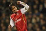 LONDON - JANUARY 19:  Tomas Rosicky of Arsenal celebrates scoring their thrid goal during the Barclays Premier League match between Fulham and Arsenal at Craven Cottage of January 19, 2008 in London, England.  (Photo by Phil Cole/Getty Images)