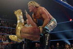 LAS VEGAS - DECEMBER 2:  (U.S. TABLOIDS OUT)   WWE wrestlers Rey Mysterio (in gold) and Chris Jericho perform on stage during the '1st Annual Video Game Awards' at the MGM Grand Garden Arena December 2, 2003 in Las Vegas, Nevada.  The show premieres on Spike T.V. Thursday, December 4 at 9:00PM ET/PT.  (Photo by Frank Micelotta/Getty Images)