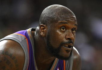 OAKLAND, CA - MARCH 15:  Shaquille O'Neal #32 of the Phoenix Suns looks on against the Golden State Warriors during an NBA game on March 15, 2009 at Oracle Arena in Oakland, California. NOTE TO USER: User expressly acknowledges and agrees that, by downloading and or using this photograph, User is consenting to the terms and conditions of the Getty Images License Agreement.  (Photo by Jed Jacobsohn/Getty Images)