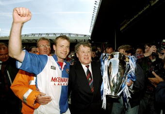 14 May 1998:  Alan Shearer and Jack Walker the owner of Blackburn Rovers celebrate with the trophy after winning the Premiership title during the FA Carling Premiership match against Liverpool played at Anfield in Liverpool, England.  The match finishedin a 2-1 victory for Liverpool, however, Blackburn Rovers clinched the title from the hands of Manchester United despite losing. \ Mandatory Credit: Shaun Botterill /Allsport