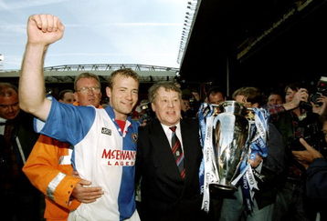 14 May 1998:  Alan Shearer and Jack Walker the owner of Blackburn Rovers celebrate with the trophy after winning the Premiership title during the FA Carling Premiership match against Liverpool played at Anfield in Liverpool, England.  The match finishedin a 2-1 victory for Liverpool, however, Blackburn Rovers clinched the title from the hands of Manchester United despite losing. \ Mandatory Credit: Shaun Botterill /Allsport