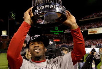PHILADELPHIA - OCTOBER 29:  Jimmy Rollins #11 of the Philadelphia Phillies celebrates with the World Series Championship trophy after their 4-3 win against the Tampa Bay Rays during the continuation of game five of the 2008 MLB World Series on October 29, 2008 at Citizens Bank Park in Philadelphia, Pennsylvania.  (Photo by Pool/Getty Images)
