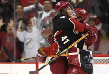 GLENDALE, AZ - APRIL 11:  Enver Lisin #18 and Viktor Tikhonov #41 of the Phoenix Coyotes celebrate after Tikhonov scored the game winning shootout goal against the Anaheim Ducks during the NHL game at Jobing.com Arena on April 11, 2009 in Glendale, Arizona. The Coyotes defeated the Ducks in 5-4 in an overtime shootout.  (Photo by Christian Petersen/Getty Images)