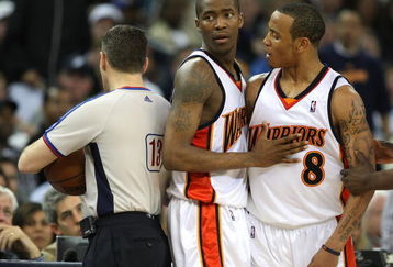 OAKLAND, CA - MARCH 30:  Monta Ellis #8 of the Golden State Warriors is restrained by teammate Jamal Crawford #6 after being called for a technical foul by referee Monty McCutchen against the Memphis Grizzlies during an NBA game on March 30, 2009 at Oracle Arena in Oakland, California. NOTE TO USER: User expressly acknowledges and agrees that, by downloading and or using this photograph, User is consenting to the terms and conditions of the Getty Images License Agreement.  (Photo by Jed Jacobsohn/Getty Images)