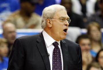 ORLANDO, FL - JUNE 14:  Head coach Phil Jackson of the Los Angeles Lakers calls out in the first half against the Orlando Magic in Game Five of the 2009 NBA Finals on June 14, 2009 at Amway Arena in Orlando, Florida.  NOTE TO USER:  User expressly acknowledges and agrees that, by downloading and or using this photograph, User is consenting to the terms and conditions of the Getty Images License Agreement.  (Photo by Ronald Martinez/Getty Images)