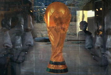 BEIJING, CHINA - JUNE 5: (CHINA OUT) An attendant is seen through a show window featuring football stars and the World Cup trophy at an adidas shop on June 5, 2006 in Beijing, China. Billboards and decorations featuring imagery relating to the World Cup, which starts June 9 in Germany, are being displayed on many Beijing streets as the event is seen as a great opportunity for local businesses, according to local media. (Photo by China Photos/Getty Images)