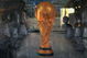 BEIJING, CHINA - JUNE 5: (CHINA OUT) An attendant is seen through a show window featuring football stars and the World Cup trophy at an adidas shop on June 5, 2006 in Beijing, China. Billboards and decorations featuring imagery relating to the World Cup, which starts June 9 in Germany, are being displayed on many Beijing streets as the event is seen as a great opportunity for local businesses, according to local media. (Photo by China Photos/Getty Images)