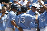 OMAHA, NE - JUNE 20:  The North Carolina bench congratulates Dustin Ackley #13 after his three-run homer in the seventh inning against the Rice Owls during the Tar Heels 6-1 win in Game 11 of the NCAA College World Series at Rosenblatt Stadium on June 20, 2007 in Omaha, Nebraska.  (Photo by Kevin C. Cox/Getty Images)