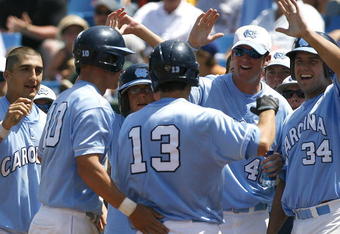 OMAHA, NE - JUNE 20:  The North Carolina bench congratulates Dustin Ackley #13 after his three-run homer in the seventh inning against the Rice Owls during the Tar Heels 6-1 win in Game 11 of the NCAA College World Series at Rosenblatt Stadium on June 20, 2007 in Omaha, Nebraska.  (Photo by Kevin C. Cox/Getty Images)