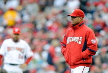 WASHINGTON - APRIL 13:  Manager Manny Acta of the Washington Nationals walks out to the pitchers mound during the game against the Philadelphia Phillies at Nationals Park on April 13, 2009 in Washington, DC.  (Photo by Greg Fiume/Getty Images)