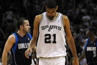 SAN ANTONIO - APRIL 28:   Forward Tim Duncan #21 of the San Antonio Spurs reacts during a 106-93 loss against the Dallas Mavericks in Game Five of the Western Conference Quarterfinals during the 2009 NBA Playoffs at AT&T Center on April 28, 2009 in San Antonio, Texas. NOTE TO USER: User expressly acknowledges and agrees that, by downloading and or using this photograph, User is consenting to the terms and conditions of the Getty Images License Agreement.  (Photo by Ronald Martinez/Getty Images)