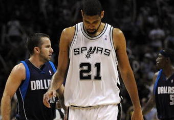 SAN ANTONIO - APRIL 28:   Forward Tim Duncan #21 of the San Antonio Spurs reacts during a 106-93 loss against the Dallas Mavericks in Game Five of the Western Conference Quarterfinals during the 2009 NBA Playoffs at AT&T Center on April 28, 2009 in San Antonio, Texas. NOTE TO USER: User expressly acknowledges and agrees that, by downloading and or using this photograph, User is consenting to the terms and conditions of the Getty Images License Agreement.  (Photo by Ronald Martinez/Getty Images)