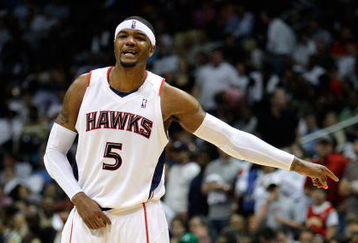 ATLANTA - MAY 11:  Josh Smith #5 of the Atlanta Hawks looks on during action against the Cleveland Cavaliers during Game Four of the Eastern Conference Semifinals during the 2009 NBA Playoffs at Philips Arena on May 11, 2009 in Atlanta, Georgia.  NOTE TO USER: User expressly acknowledges and agrees that, by downloading and/or using this Photograph, user is consenting to the terms and conditions of the Getty Images License Agreement.  (Photo by Andy Lyons/Getty Images)
