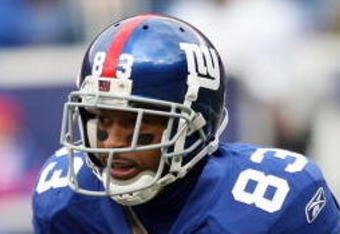 EAST RUTHERFORD, NJ - DECEMBER 07: Sinorice Moss #83 of the New York Giants returns a kickoff against the Philadelphia Eagles at Giants Stadium on December 7, 2008 in East Rutherford, New Jersey.  (Photo by Nick Laham/Getty Images)