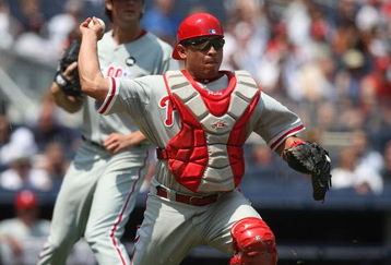 NEW YORK - MAY 24:  Carlos Ruiz #51 of the Philadelphia Phillies throws to first against the New York Yankees on May 24, 2009 at Yankee Stadium in the Bronx borough of New York City.  (Photo by Nick Laham/Getty Images)