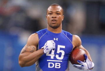 INDIANAPOLIS, IN - FEBRUARY 24:  Defensive back Glover Quin of New Mexico runs with the football in practice drills during the NFL Scouting Combine presented by Under Armour at Lucas Oil Stadium on February 24, 2009 in Indianapolis, Indiana. (Photo by Scott Boehm/Getty Images)