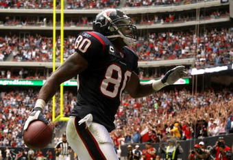 HOUSTON - DECEMBER 14:  Wide receiver Andre Johnson #80 of the Houston Texans celebrates after making a touchdown catch against the Tennessee Titans on December 14, 2008 at Reliant Stadium in Houston, Texas.  (Photo by Stephen Dunn/Getty Images)