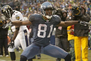 SEATTLE - DECEMBER 23:  Wide receiver Nate Burleson #81 of the Seattle Seahawks celebrates after scoring a touchdown against the Baltimore Ravens at Qwest Field on December 23, 2007 in Seattle, Washington. The Seahawks defeated the Ravens 27-6. (Photo by Otto Greule Jr/Getty Images)